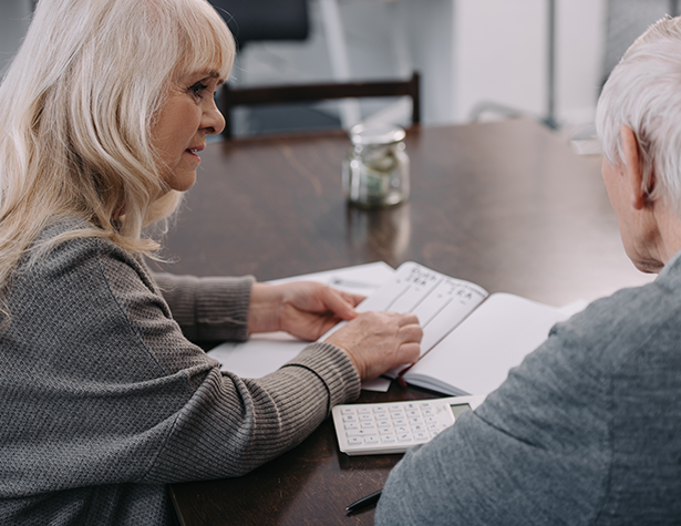 elderly couple discussing